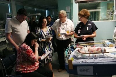 Teddy just hours old being baptised before his first open heart surgery