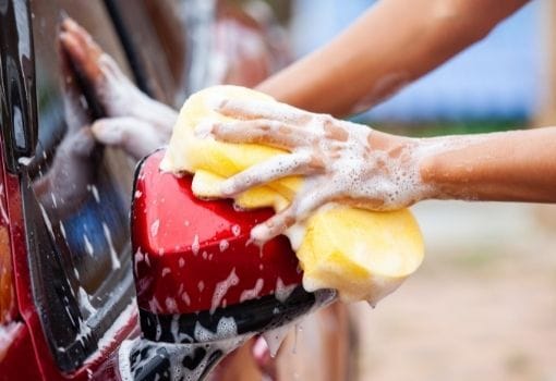 Can I use dishwashing soap to wash my car?