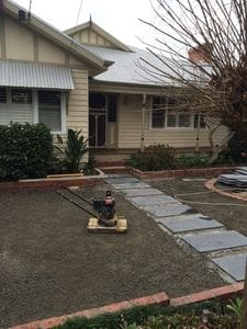 Preparing a base for artificial turf