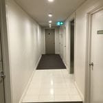 Apartment complex corridor lighting. Image -5c7733be49366