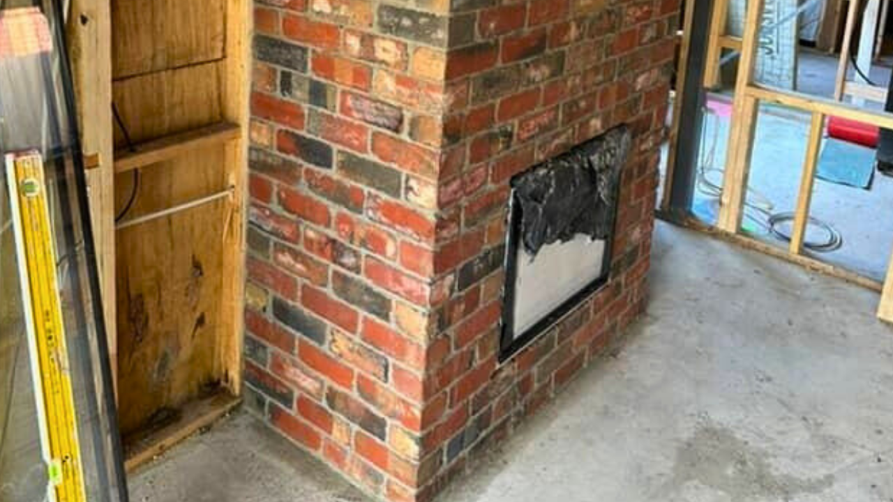 EcoGroup red/blue clinker 2nd hand bricks were used in this fireplace
