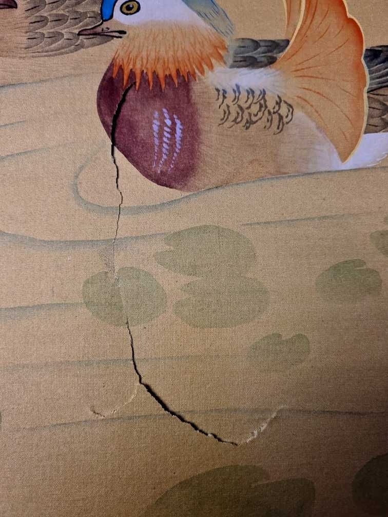 Before image restoration on Asian Screen with paper tear Restoration Images Image -61145cbe53f0c