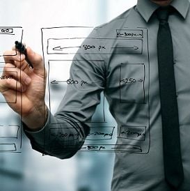 HYBRID WEB TAKES ON BIG GUNS AND WINS
