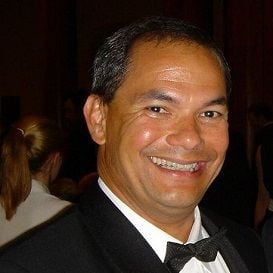 TOM TATE TO SLASH GOLD COAST DEBT