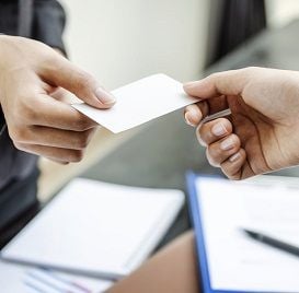 KICKING PAPER CARDS TO THE CURB