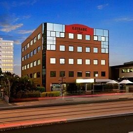 NEARLY EMPTY OFFICE TOWER SELLS FOR $5.8M