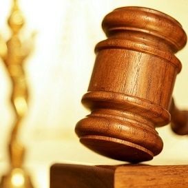 SLATER AND GORDON TAKES SPOTLESS TO COURT