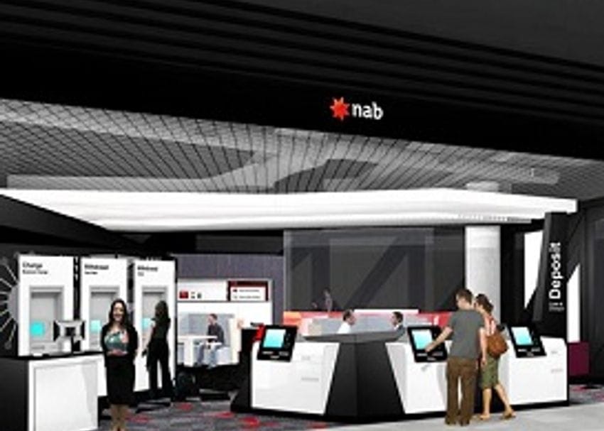 NAB LIFTS PROFIT BUT SWINGS THE AXE