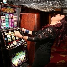 Crown Resorts slaps government with lawsuit as profits dive