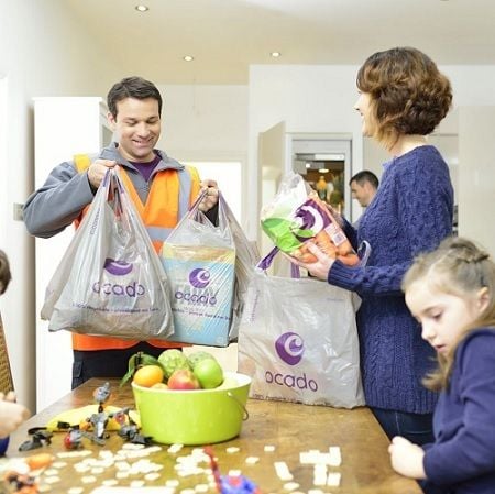 Coles enters e-commerce big leagues with leading British online grocer Ocado