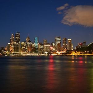 Dexus buys big in office markets, but revaluations hit profit