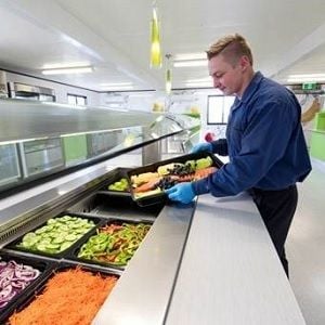 Downer to raise $400m, mulls exit from Spotless hospitality business