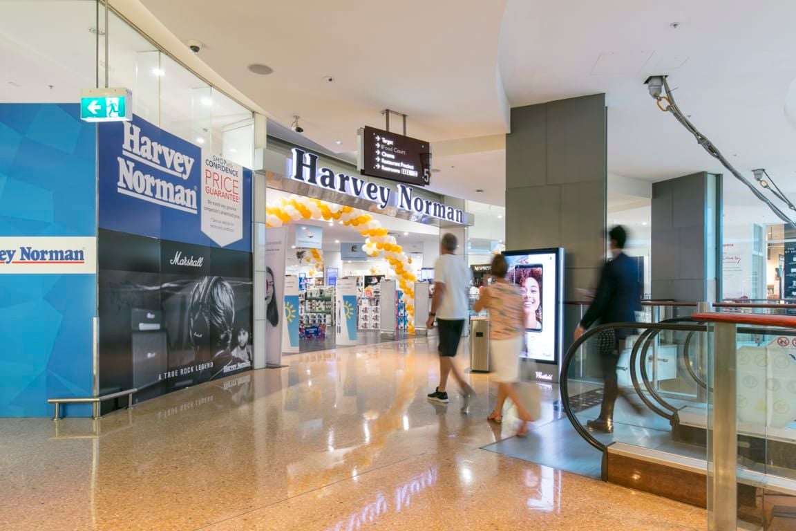 Harvey Norman succumbs to pressure, repays JobKeeper after electrified profit