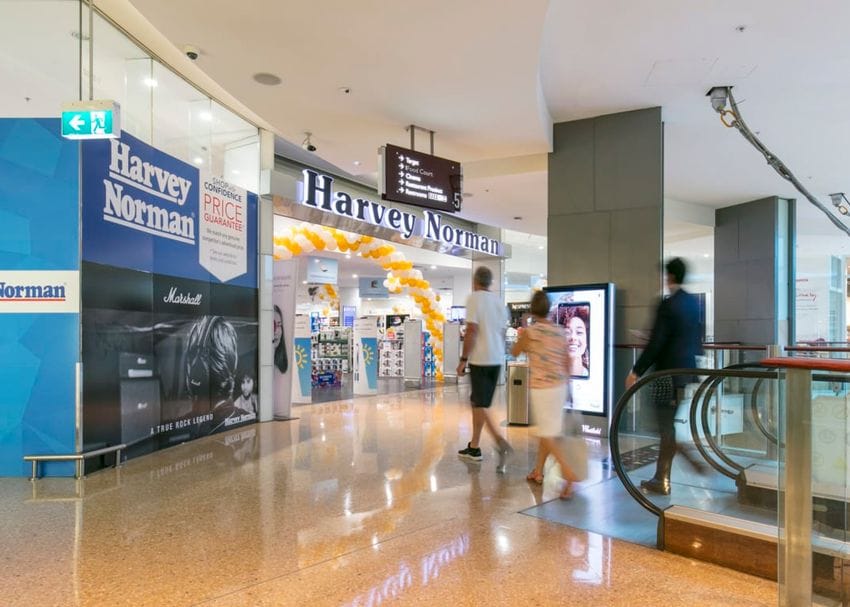 Harvey Norman succumbs to pressure, repays JobKeeper after electrified profit