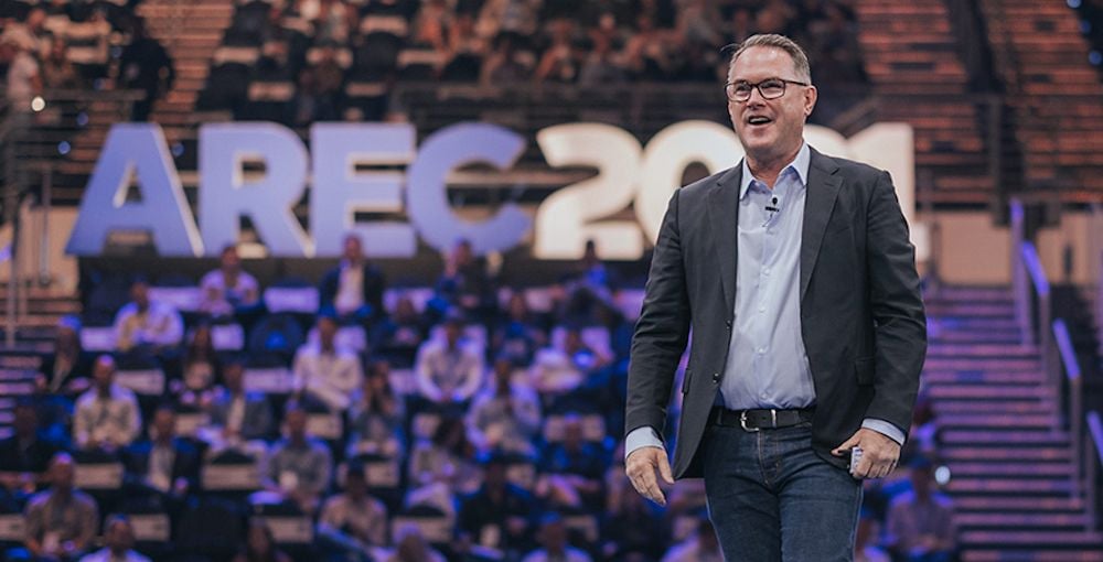 John McGrath calls for calm as real estate company forecasts rise in earnings for FY22