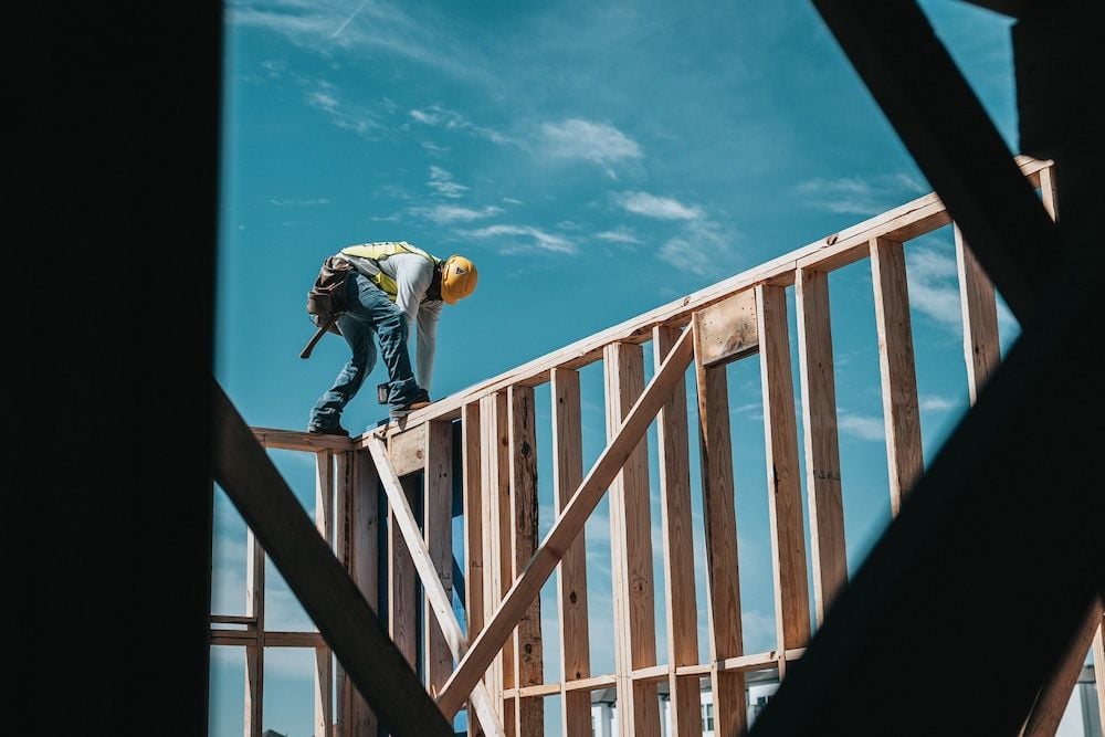 Timber shortages look set to delay home building into 2023. These 4 graphs show why