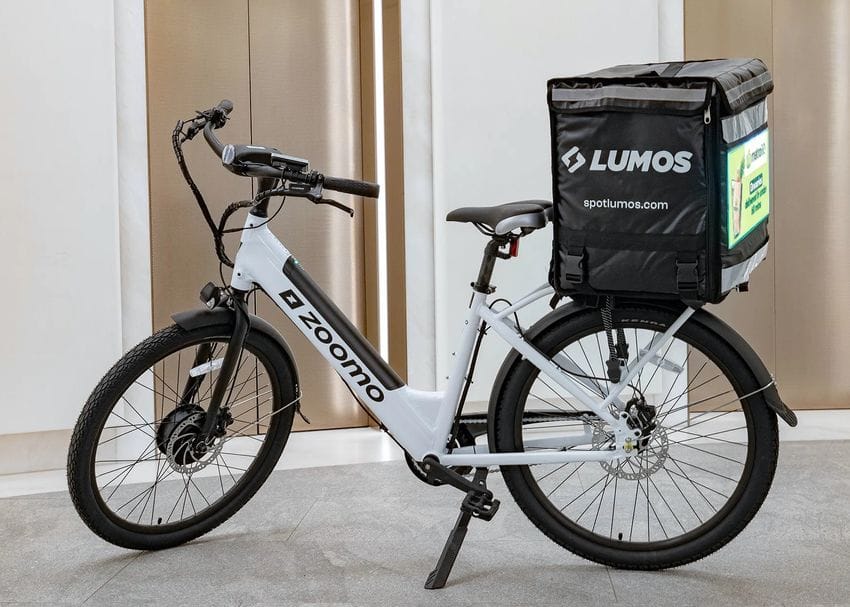 Smart bag ad-tech Lumos joins forces with e-bike innovator Zoomo
