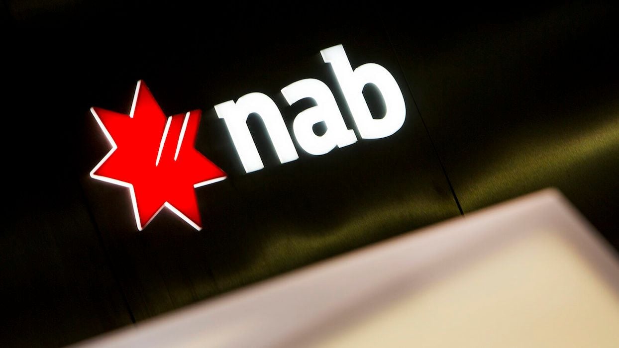 NAB shares sink 8pc despite higher rates helping push interim profit to record $4b