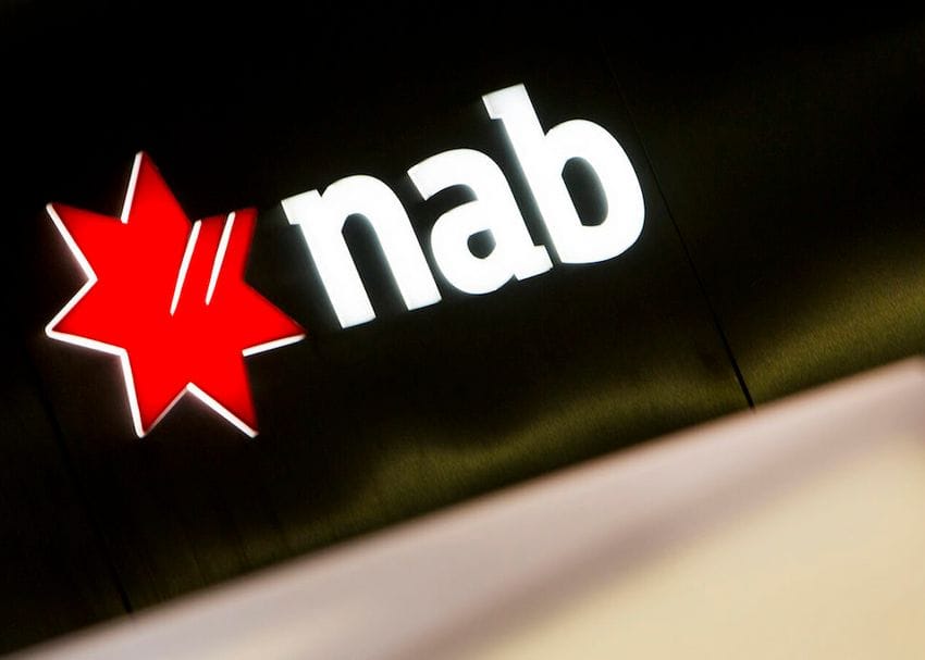 NAB shares sink 8pc despite higher rates helping push interim profit to record $4b
