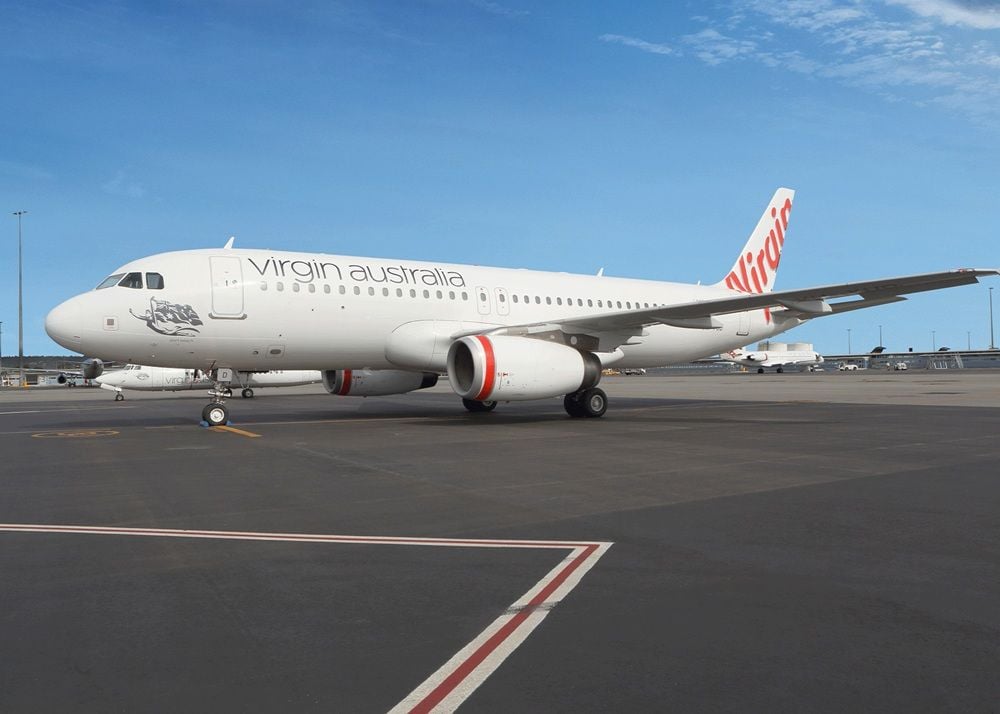 Virgin Australia follows Qantas to lift fares and cut capacity as jet fuel prices double