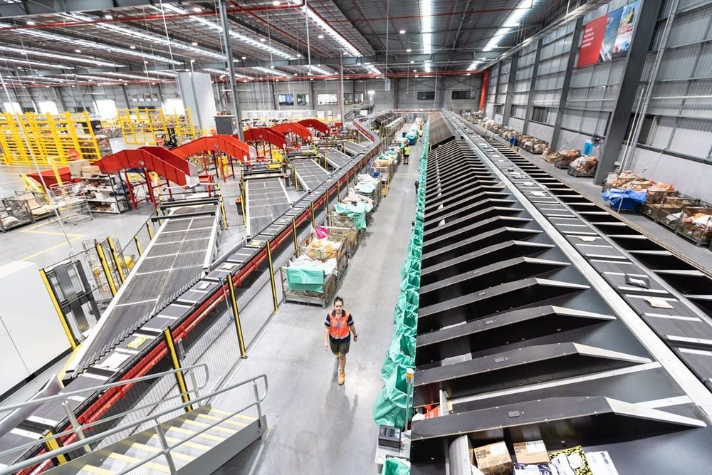Australia Post opens giant parcel facility in Brisbane and flags new Hobart hub amid e-commerce boom