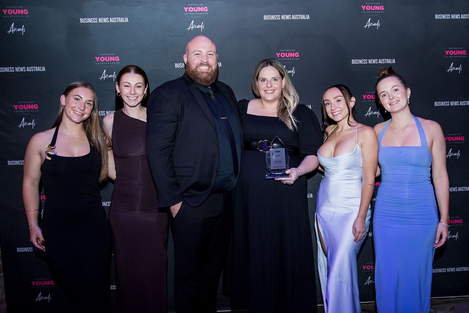 2025 Sydney Young Entrepreneur Awards Gala dinner Winners accepting trophies on stage at the 2025 Sydney Young Entrepreneur Awards