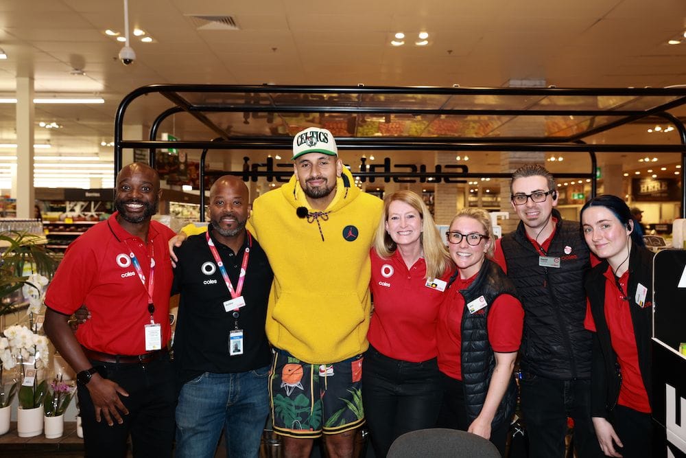 Nick Kyrgios with Coles staff