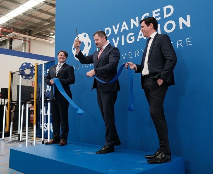 Ed Husic, Federal Minister for Industry and Science, cutting the ribbon with the Advanced Navigation co-founders for the opening of a  high-tech robotics facility for autonomous systems at UTS Tech Lab in September 2023.