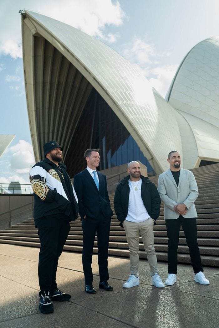 NSW Premier Chris Minns with UFC fighters (L-R) Tai Tuivasa, Alex Volkanovski and Robert Whittaker.