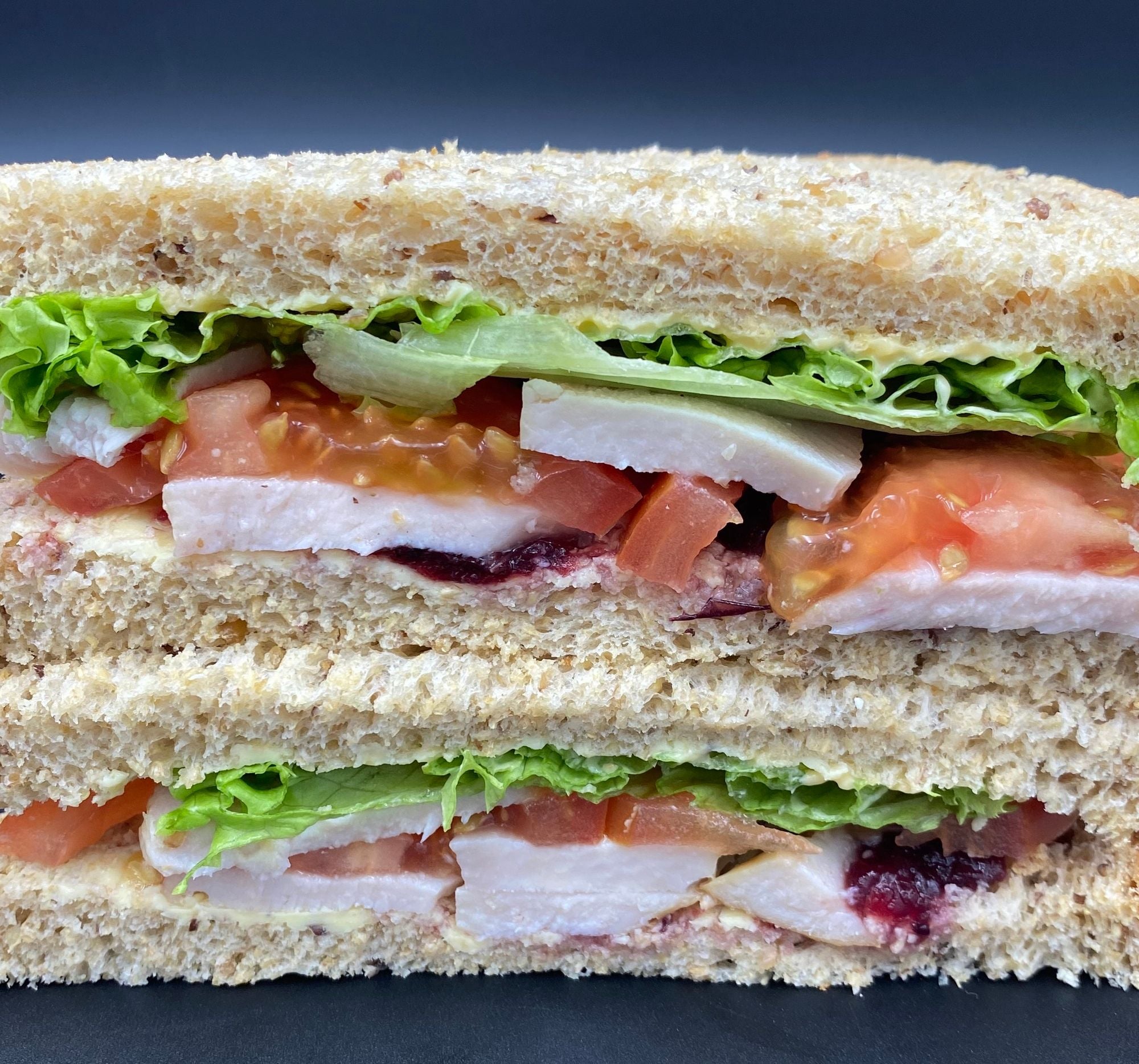 Smoked Chicken Sandwich - Half (with Smoken chicken , salad ,Cranberry sauce, in-house mayo and mature cheese)