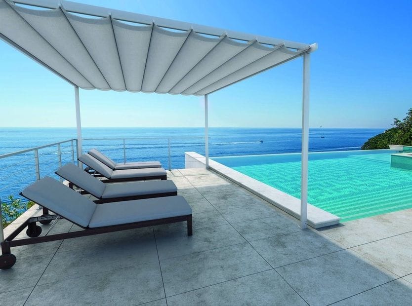 Surya Retractable Roofing Awnings look great poolside freestanding or attached to a wall. Manual operation with range of colours
