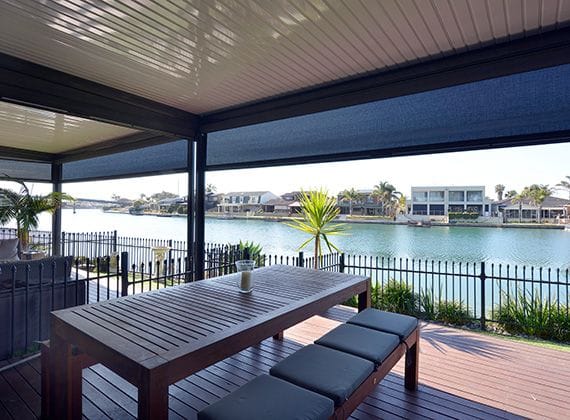 Ziptrak awnings on deck overlooking water Ziptrak awnings on deck overlooking water