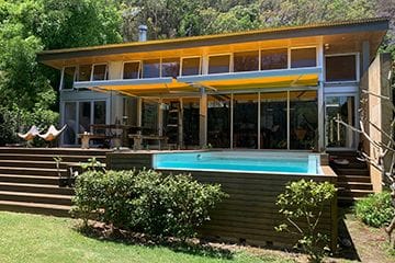 Folding Arm Awning over deck and pool
