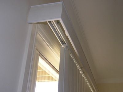 Vertical blind with linear pelmet over top Vertical blind with linear pelmet over top