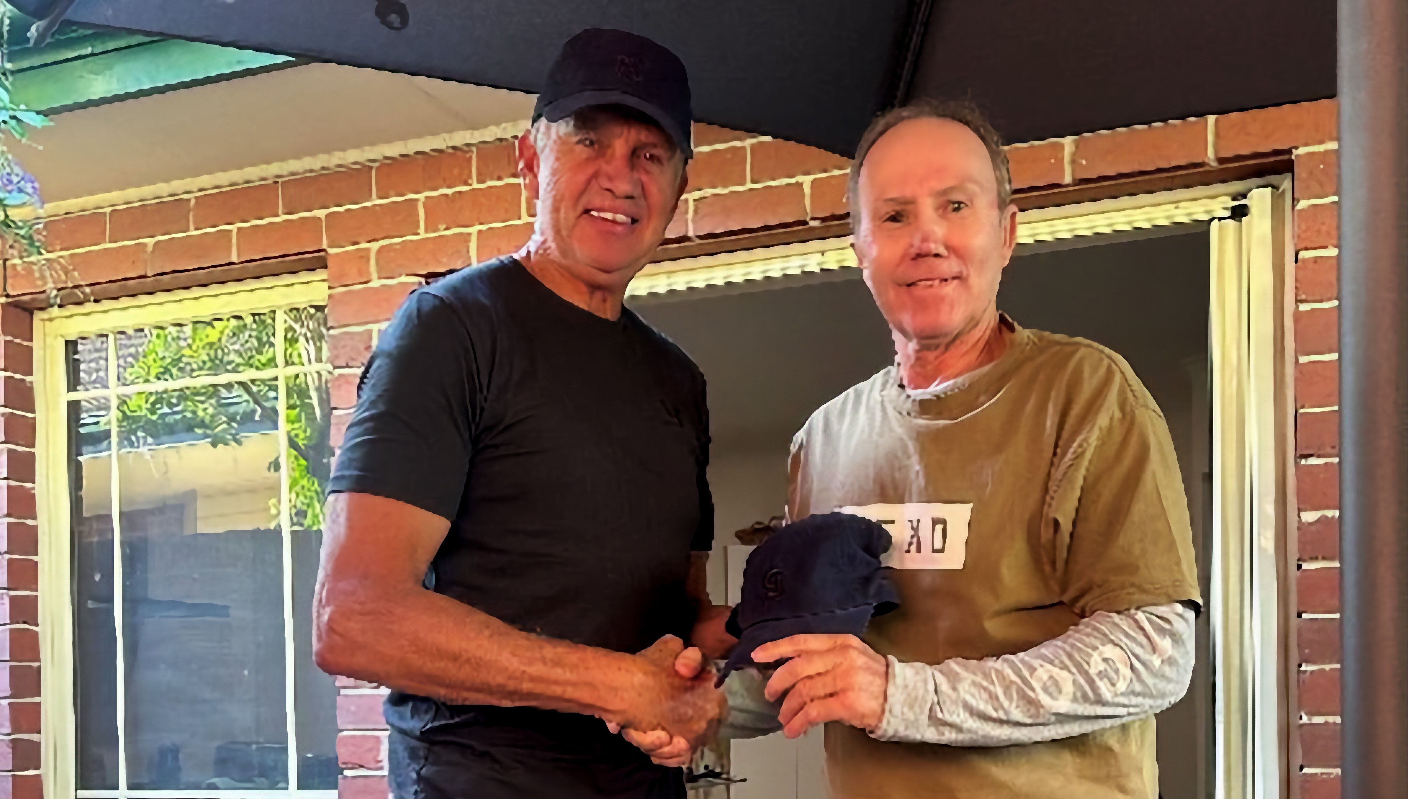 Phil Would receiving his ‘Baggie Blue’ from Brenton Honor PastPlayersandOfficials Image -692ad25178705