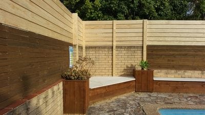 Raised this pool boundary fence 900mm with dressed slats