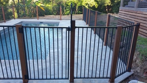 Merbau posts & charcoal tubular alum pool fence