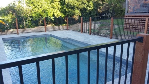 Merbau posts & charcoal tubular alum pool fence