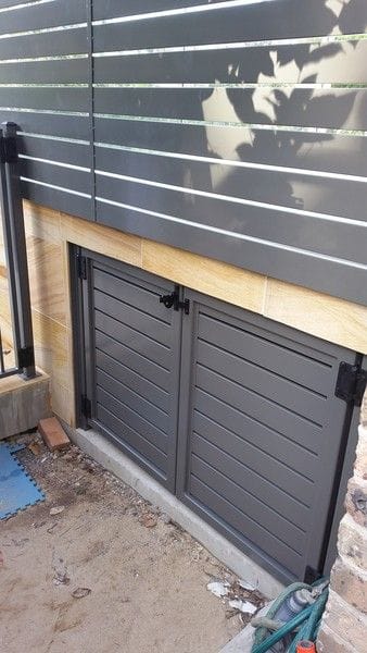 3-woodland-grey-alum-slat-gates-under-patio