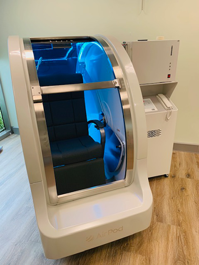 A seated AirPod - an air-only mild hyperbaric chamber