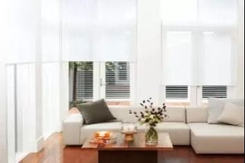 Quantum roller blind with Lintex Translucent white fabric in living area