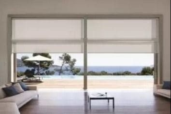 Quantum heavy Duty Roller Blind covering living room window,ocean view, translucent blind fabric