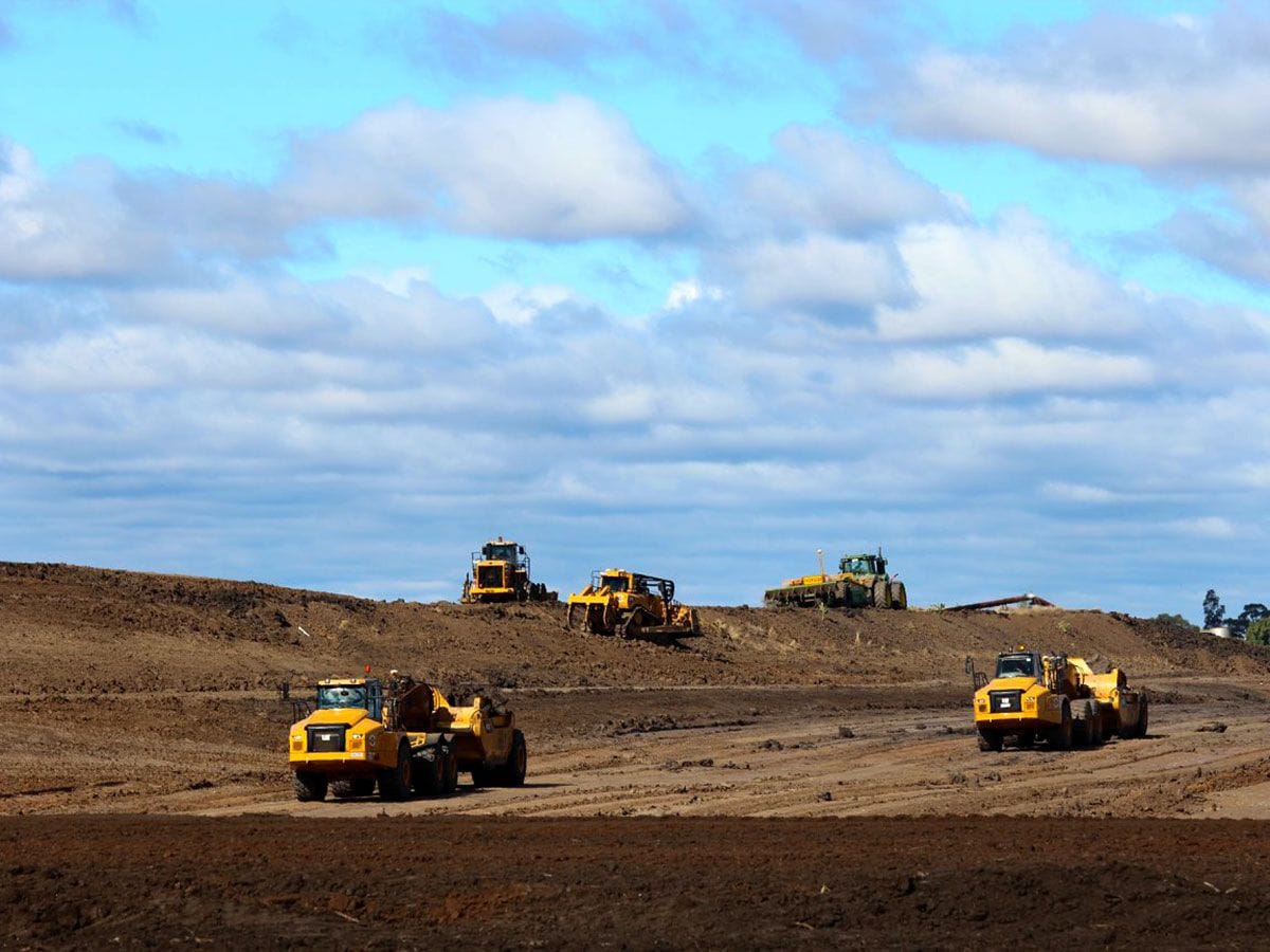 5 peices of earthmoving equipment hard at work in south west queensland