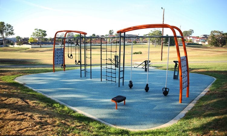 Synthetic Grass and Rubber | Rubber Wetpour Outdoor Fitness Station