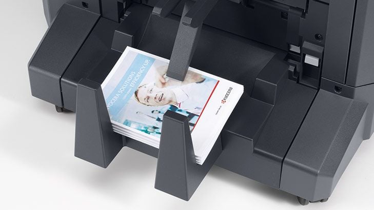 Professional looking presentations and proposals can produced inhouse with the right solution. Here we see full colour, saddle-stitched booklets exiting the Kyocera TASKalfa MZ5001ci Professional looking presentations and proposals can produced inhouse with the right solution. Here we see full colour, saddle-stitched booklets exiting the Kyocera TASKalfa MZ5001ci