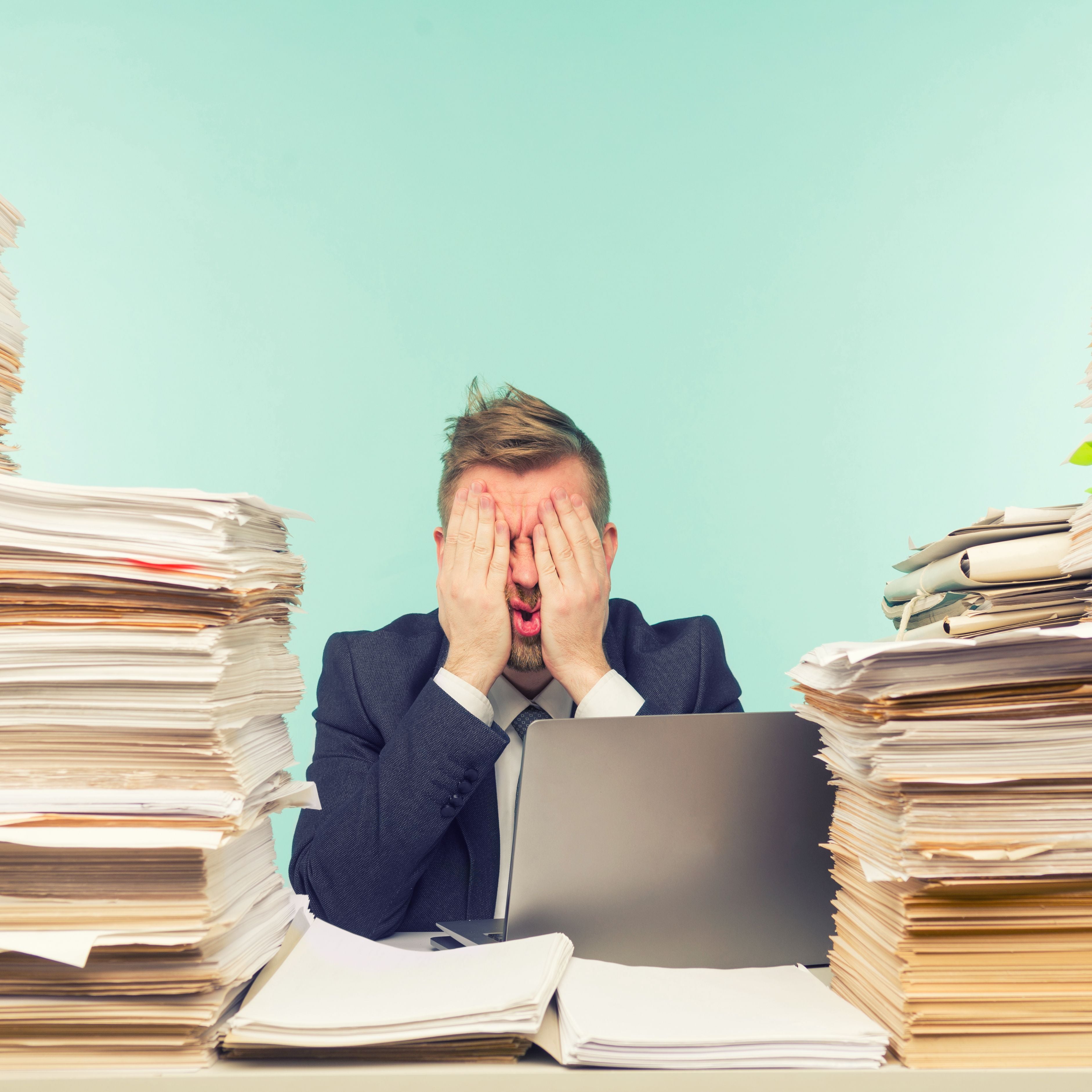 Stressed out man, sitting at a desk, surrounded by stacks of file folders. Fusion Managed Services can help him get through his work quickly with some of our digital transformation solutions. Stressed out man, sitting at a desk, surrounded by stacks of file folders. Fusion Managed Services can help him get through his work quickly with some of our digital transformation solutions.