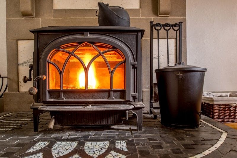 How to protect the wall behind my wood-burning stove?