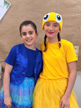 Students Performing in School Musical Production Students on stage during Finding Nemo Jr showcasing drama and performance skills