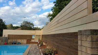 Raised this pool boundary fence by 900mm with dressed slats