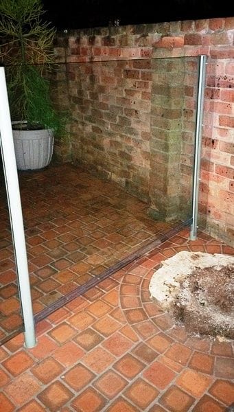 /fill-non-compliant-gaps-under-glass-fence.jpg